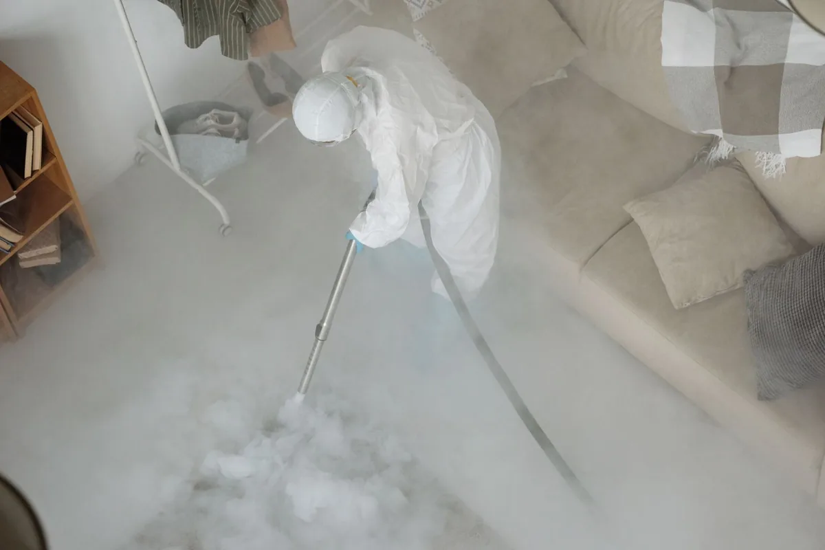 Biohazard cleanup technician in protective equipment, New Brockton, AL